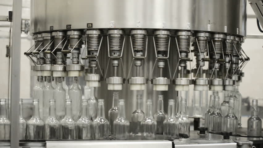 Automatic Bottle Filling Machine manufactured by Sri Laxmi Engineerings